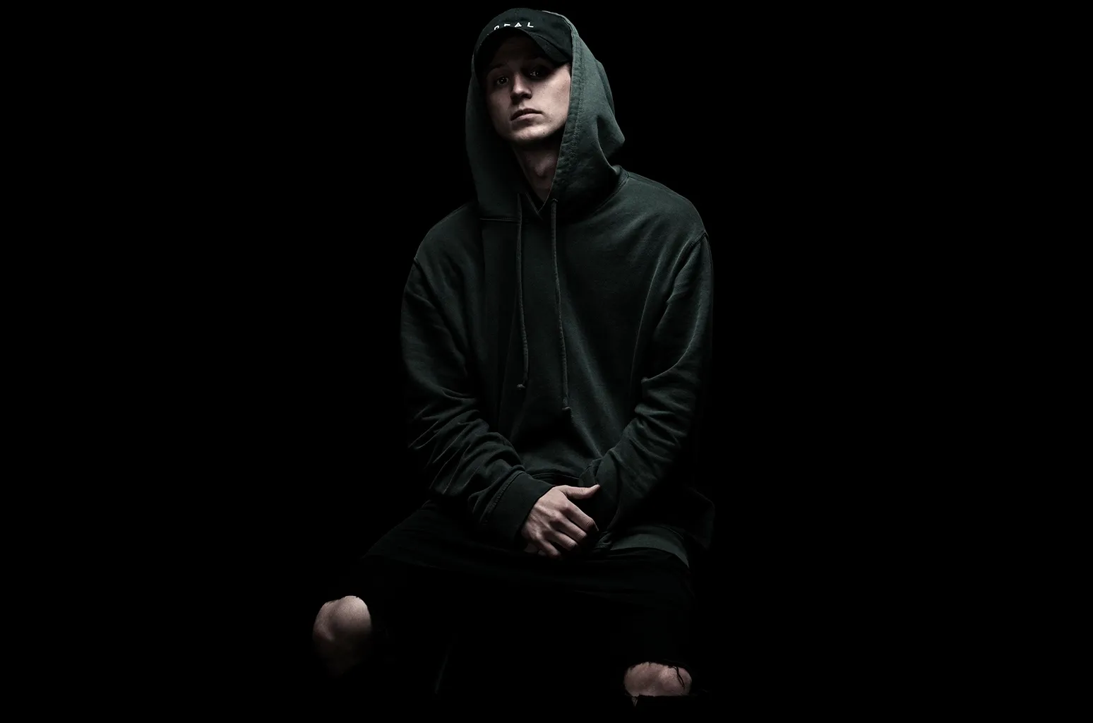 NF-rapper-press-photo-by-Jon_Taylor-Sweet-2017-billboard-1548.webp