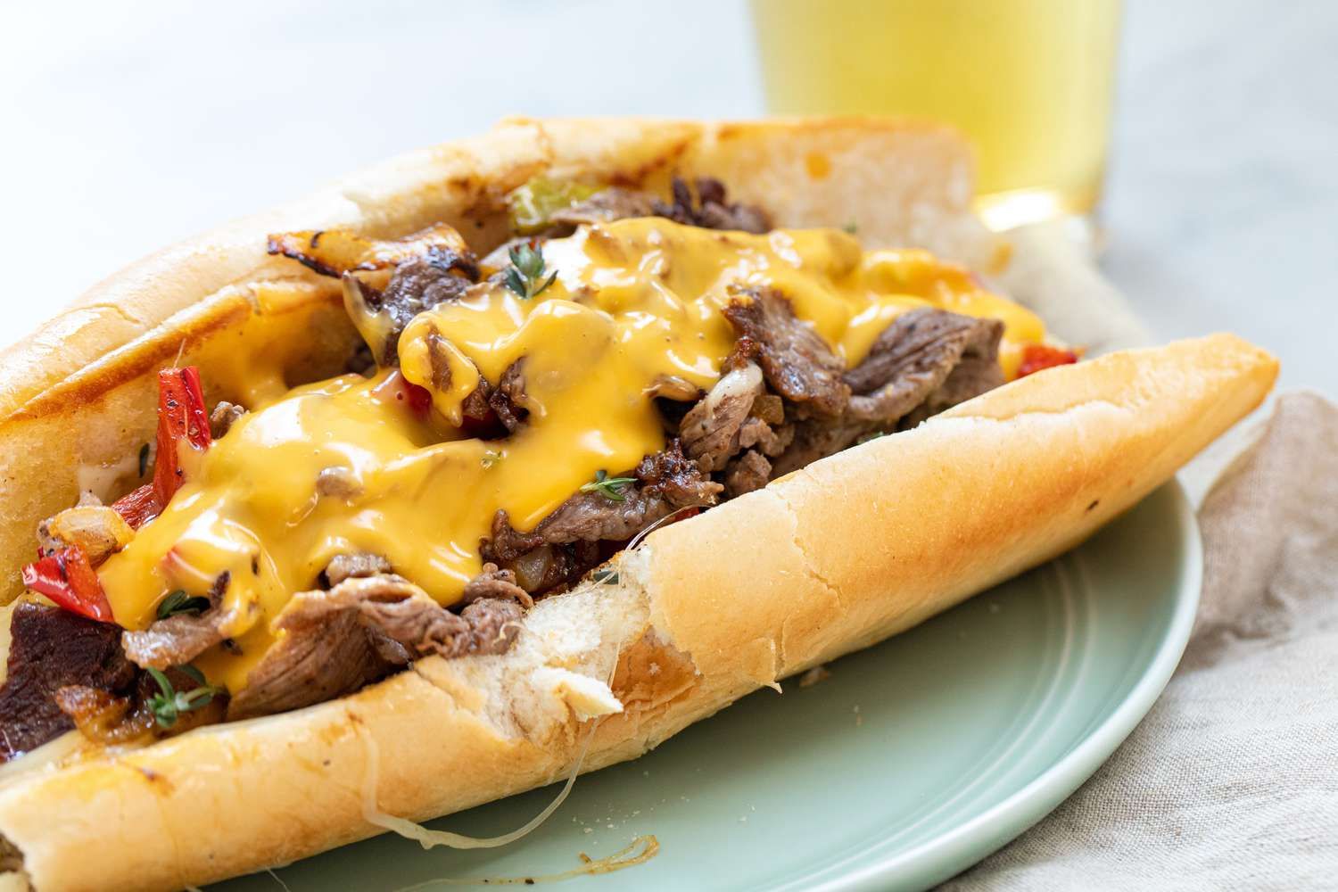 Simply-Recipes-Philly-Cheesesteak-LEAD-2-b182ca21d19344159d44efd361db1477.jpg
